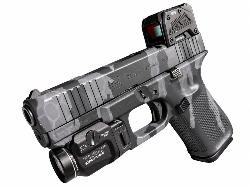 Cerakote Glock 19 Gen 5 in grey camo with red dot and Streamlight TLR-7